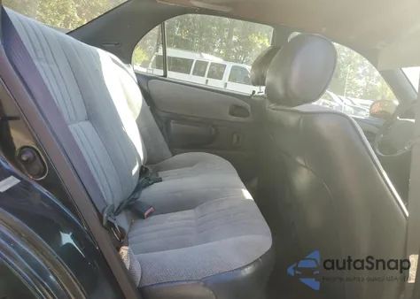 1997 Toyota Corolla Base z USA, uszkodzony, nr VIN 2T1BA02E1VC220338